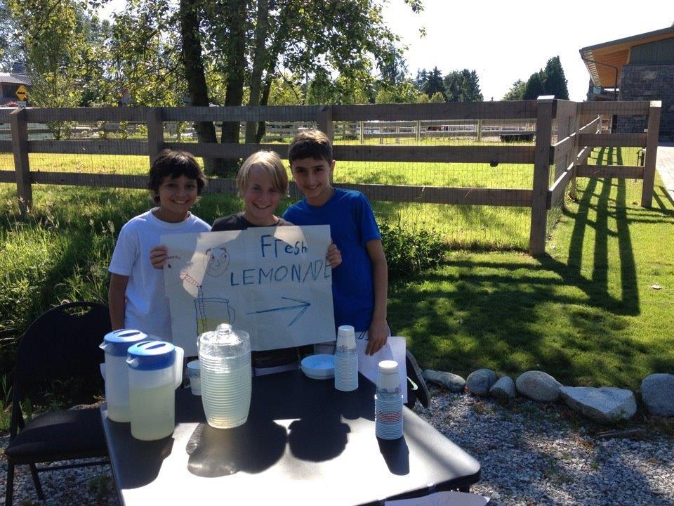 Jack and Solly with a friend at their lemonade stand, around 2012